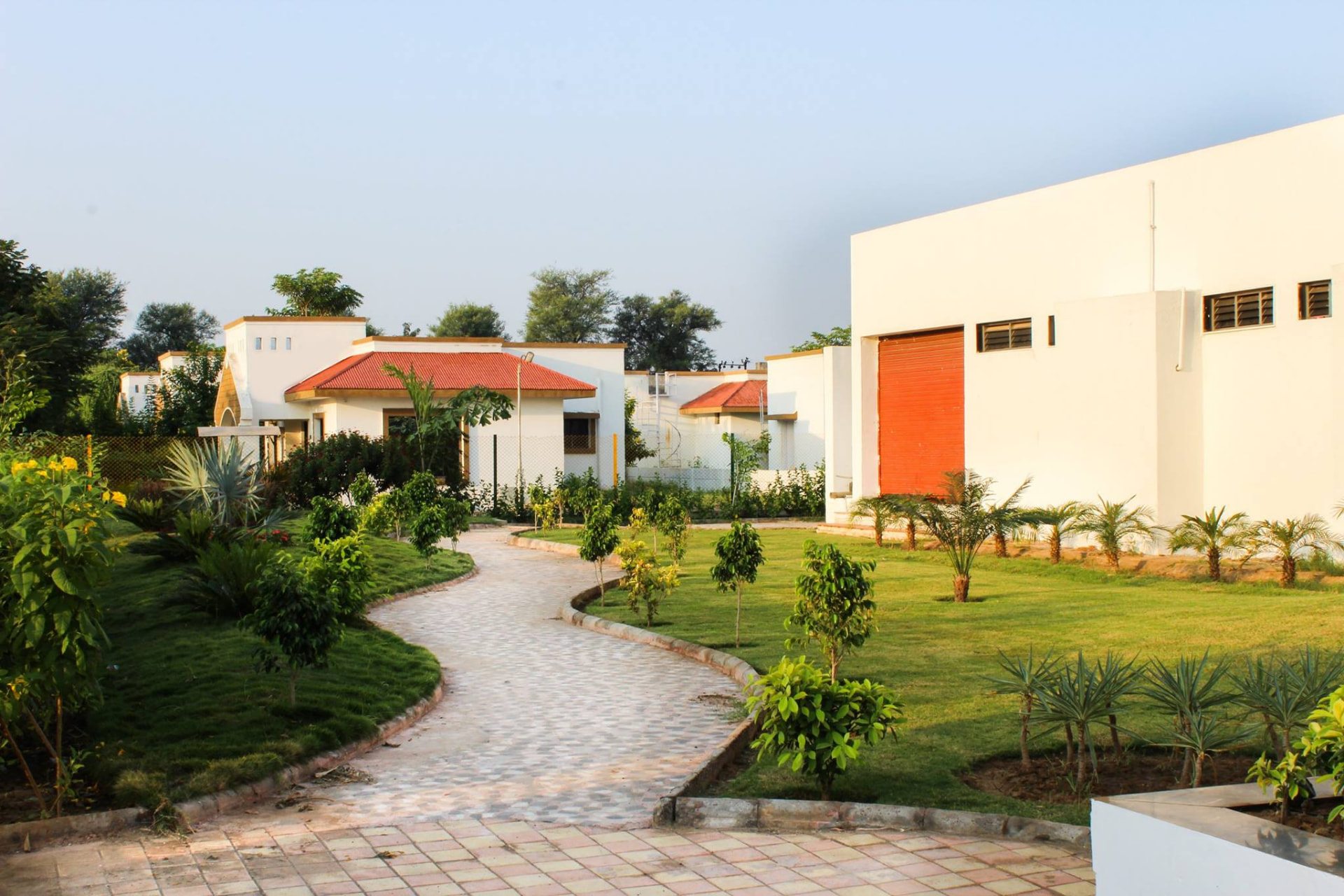 Landscaped pathway through Mahudi Township